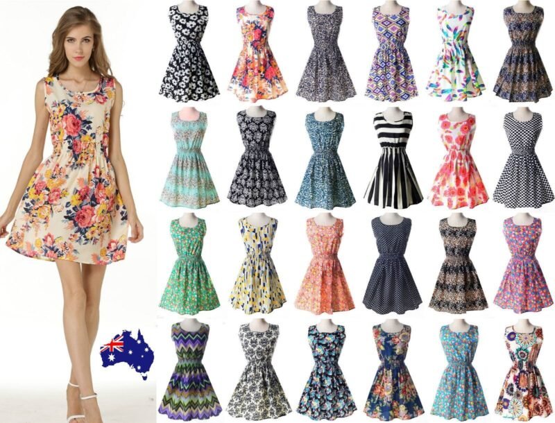 Woman in floral boho dress vibrant pattern, front view, showing sleeveless design.