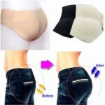 Woman in padded hip enhancer panties Nude color, front view, showing seamless design.