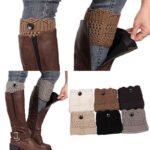 Woman in knitted boot cuffs Khaki color, front view, showing button design.