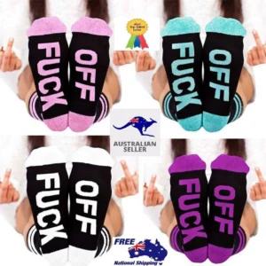 Person in funny novelty socks with letter print, front view, showing vibrant design.