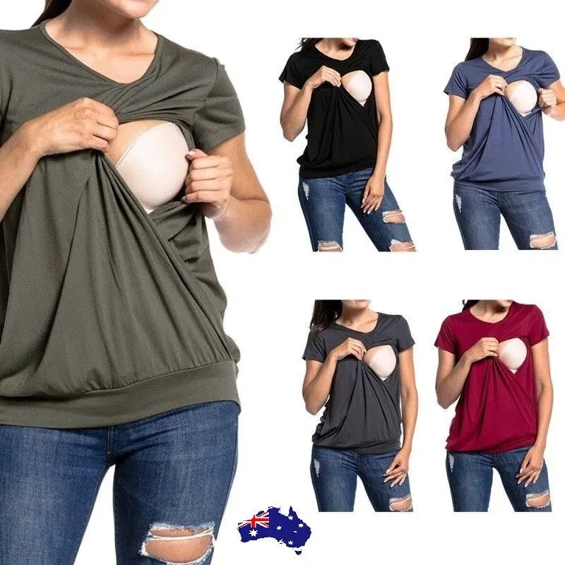 57-1574-1.jpg Woman in summer nursing top White color, front view, showing V-neck design.