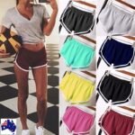 Woman in summer workout shorts Black color, front view, showing belt design.