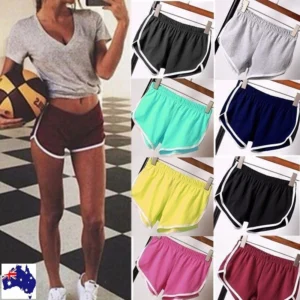 Woman in summer workout shorts Black color, front view, showing belt design.