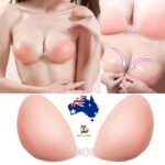 Woman in silicone adhesive bra pads Beige color, front view, showing push-up lift.