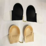 Woman in invisible backless bra strap Black color, front view, showing adjustable design.