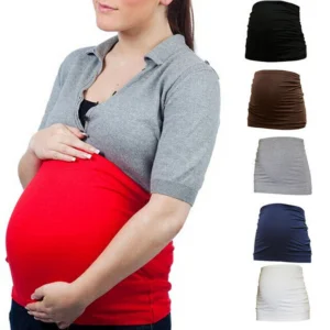 Pregnant woman in maternity support belly band, front view, showing stretchy fit.