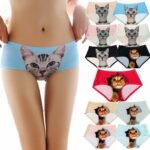Woman in seamless 3D cat panties multicolored, front view, showing kitten print.