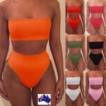 Woman in Brazilian bandeau bikini set multicolored, front view, showing off shoulder design.