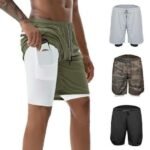 Man in 2 in 1 running shorts men Black color, front view, showing 2-in-1 design.