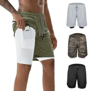 Man in 2 in 1 running shorts men Black color, front view, showing 2-in-1 design.
