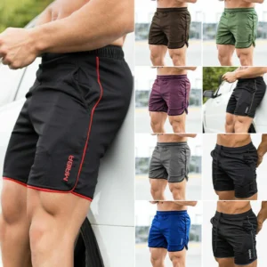 Man in dry fit gym shorts men Black color, front view, showing nylon design.