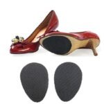 Person with anti-slip heel pads Australia Black color, front view, showing rubber pad.
