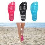 Person with waterproof foot stickers Australia Shown color, front view, showing adhesive pad.