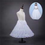 Girl with white crinoline underskirt Australia White color, front view, showing 3-hoop design.