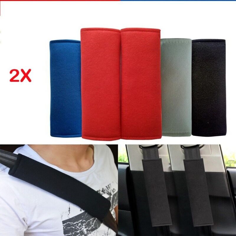 Person with car seat belt pad Australia Shown color, front view, showing soft cover.