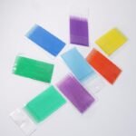 Person with eyelash extension micro brush Australia Shown color, front view, showing fine tip.