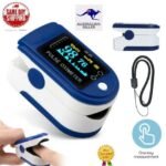 Person with fingertip pulse oximeter Australia Blue and white color, front view, showing OLED screen.