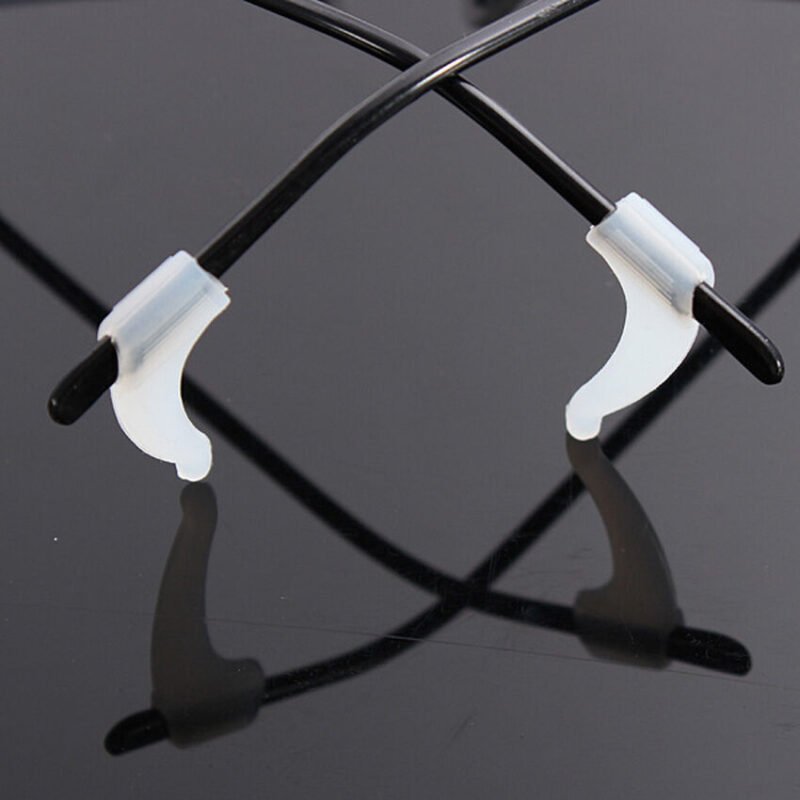 57-2414.jpg Person with silicone glasses strap Australia White color, front view, showing grip design.