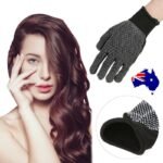 Person with hair straightener glove Australia Shown color, front view, showing insulated design.