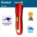 Person with Kemei hair clipper Australia Red color, front view, showing blade design.