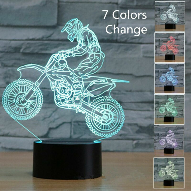 57-2523.jpg Person with dirt bike night light Australia Clear color, front view, showing 3D acrylic.