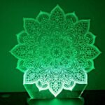 Person with mandala night light Australia Clear acrylic color, front view, showing 3D mandala.