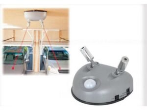 Person with dual laser parking sensor Australia Silver color, front view, showing dual lasers.