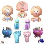 Person with baby shower balloons Australia Multicolor foil, front view, showing boy and girl designs.