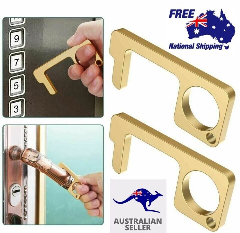 Person with no touch door opener Australia Gold/Silver color, front view, showing keychain design.