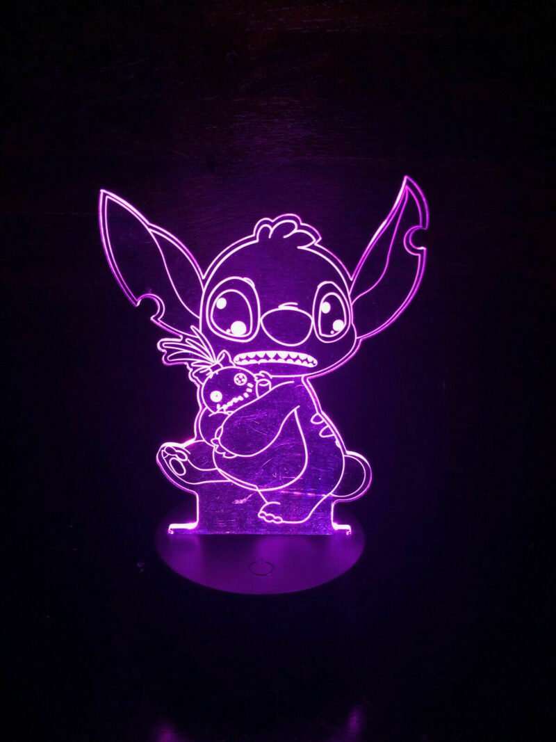 Person with Lilo and Stitch night light Australia Clear acrylic color, front view, showing 3D Stitch.