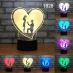 Person with wedding night light Australia Clear acrylic color, front view, showing 3D propose design.
