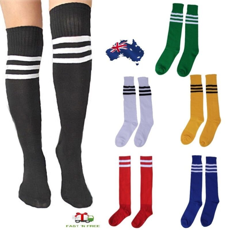 Person with knee high sports socks Australia Red color, front view, showing stripes.