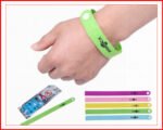 Person with mosquito repellent bracelets Australia Random color, front view, showing wrist fit.