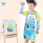 Kids cooking apron Australia Blue with elephant, front view, showing waterproof design.