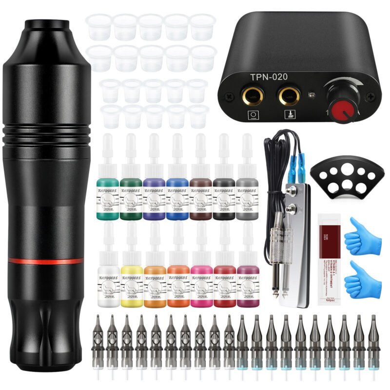Complete tattoo kit with rotary machine, inks, needles and power supply displayed on clean surface