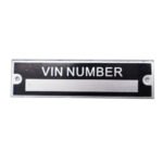 Silver blank aluminum VIN tag for vehicle identification.