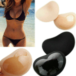 Woman wearing a black bikini chest pad on an Australian beach.