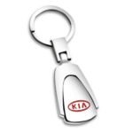 KIA titanium keychain Australia with car logo on a white background.