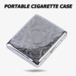 A silver stainless steel cigarette case with engraving.