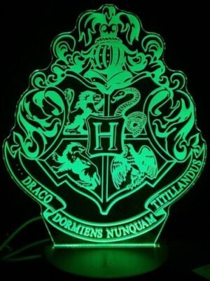 3D acrylic LED night light displaying the Hogwarts logo in green glow.