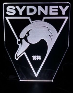 3D acrylic Sydney Swans night light glowing in red and white with the team logo.