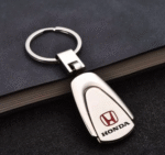 Silver Honda titanium keyring Australia with car logo.