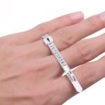 Silver ring sizer tool Australia with clear size markings.