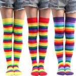 Rainbow over knee socks Australia with vibrant stripes on a woman.