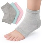 Black moisturizing heel sock with silicone sleeve on a foot, showing gel lining.