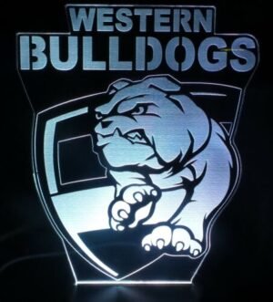 Blue Western Bulldogs 3D LED lamp glowing on a bedside table.