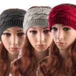Knit headwrap Australia Black color, front view, showing wide design.