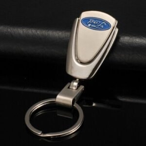 A titanium ford logo keyring with car emblem.