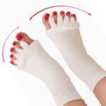Black five toe yoga socks Australia with open toe design on a yoga mat.