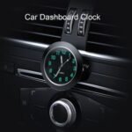 Luminous car clock Australia glowing on a car dashboard during the day.